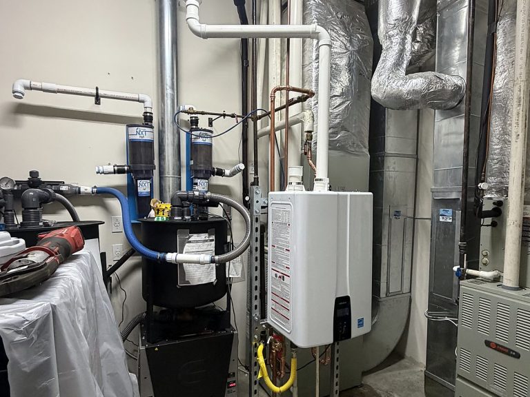 Wall-mounted tankless water heater in a utility room