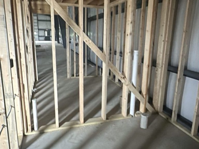 Framed room with plumbing rough-in