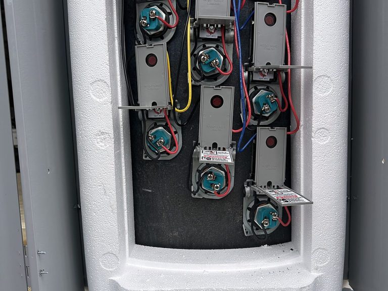 Open electric water heater control panel