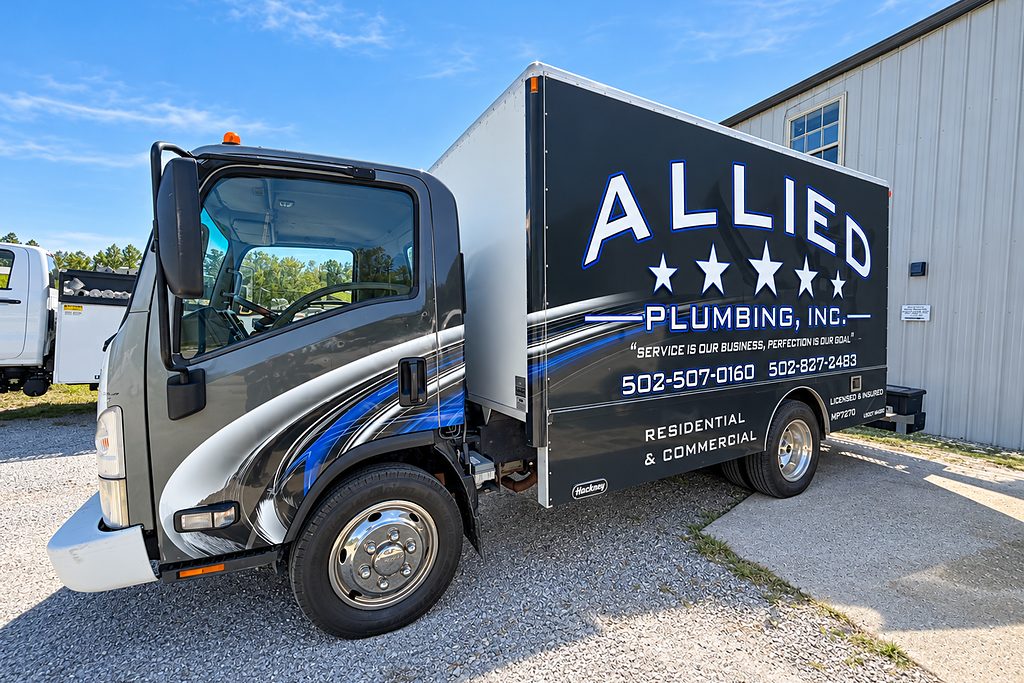 The Allied Plumbing box truck outside the shop in Bardstown, Kentucky