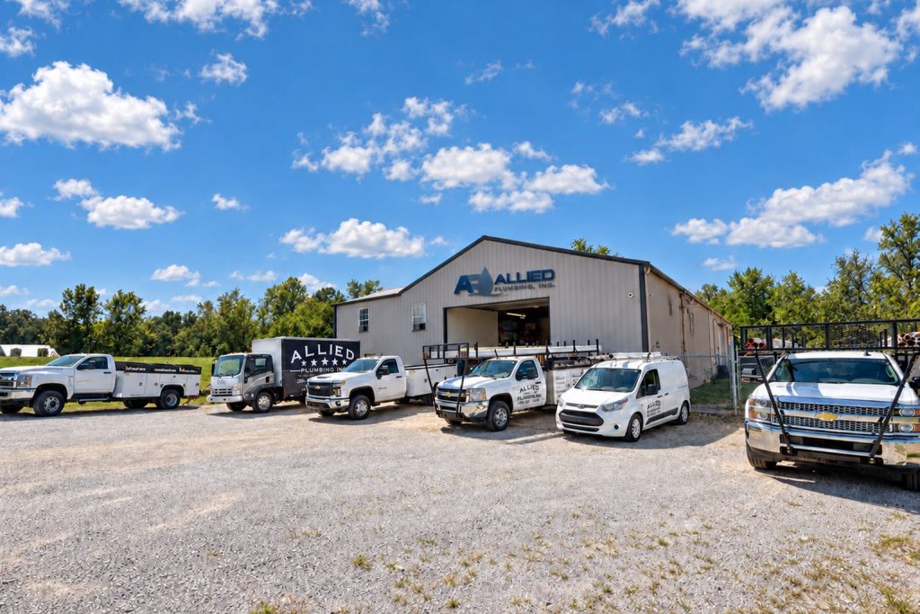 The Allied Plumbing trucks lined up outside the shop in Bardstown, Kentucky
