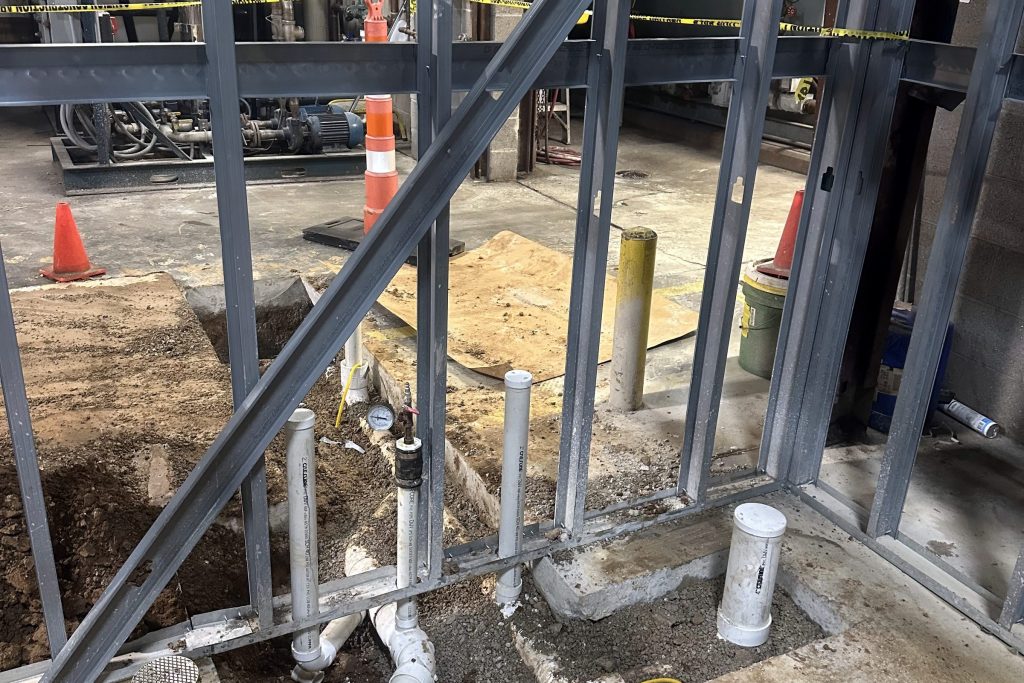 Under-slab plumbing rough-in on a commercial build
